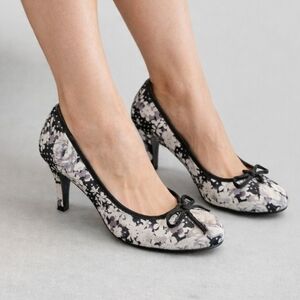 Black and white floral pumps